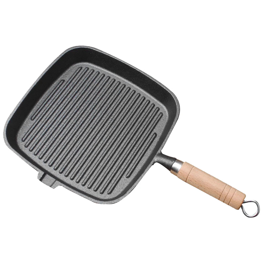 Cast iron skillet steak pan with wooden handle, uncoated and ideal for camping cooking